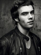 © Bakulov - Closeup of a beautiful young man in black leather jacket. Contrast black and white portrait