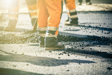 Wall Mural - Teamwork on road construction