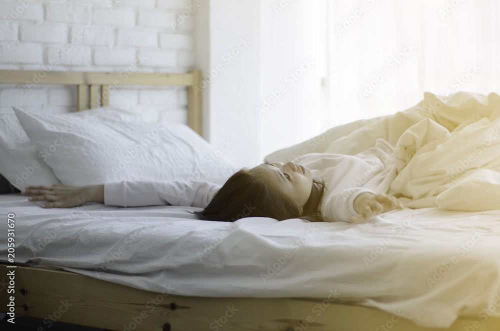 Printed Tiles Women Sit At The Edge Of The Bed And