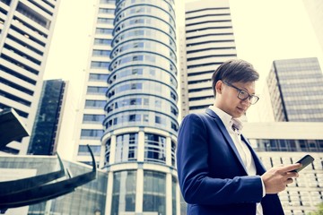 Asian businessman in a city