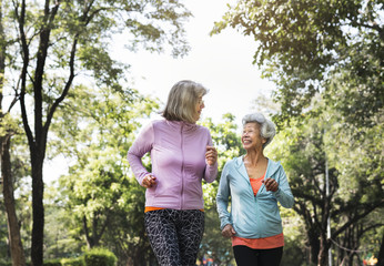 Canvas Print - Senior friends exercising outdoors