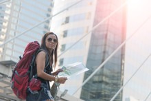 Traveler Woman Looking On A Big City, Travel And Active Lifestyle Concept