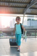 © nareekarn - Child with suitcase and city map on summer vacation. Travel and adventure concept.