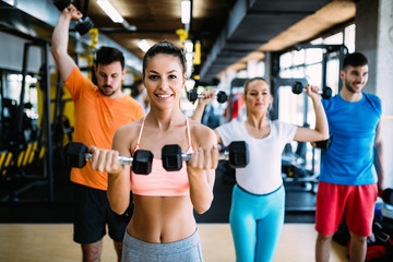 Canvas Print - Picture of cheerful fitness team in gym