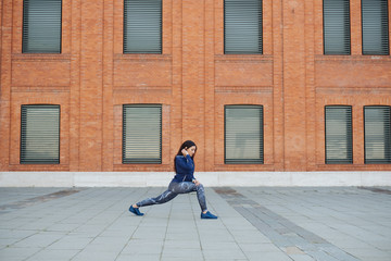 Wall Mural - Fitness woman on urban fitness workout