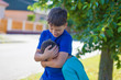 © sakkmesterke - Kids bullying outdoor on street