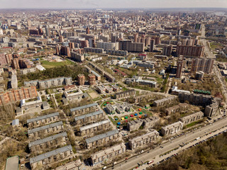 Wall Mural - Old and new russian buildings in green area in the cty with a lot of cars. Zhukovskogo street, Novosibirsk.