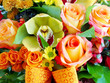 Flower bouquet made of roses, orchids, chrysanthemums, button poms and snapdragon flowers