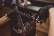 Close-up Of Man Haircut, Master Does Hair Styling In Barber Shop