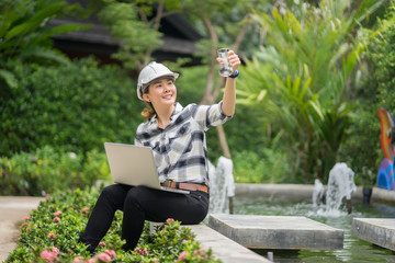 environment engineer with tablet ,inspection in workplace for architectural plan,sketching a constructions project at construction site,Business concept vintage color