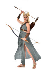 Wall Mural - full length portrait of pretty blonde lady wearing fantasy toga gown,  and holding a bow and arrow. standing pose on white background.