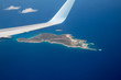 Flug mit Ausblick auf karibische Insel
