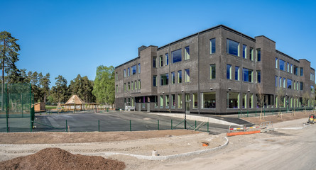 Wall Mural - A new school building and school yard in Stockholm, Haninge, almost completely ready