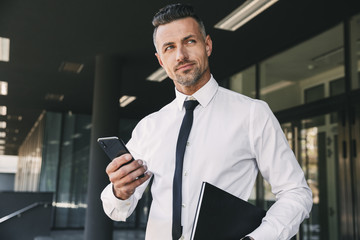 Wall Mural - portrait of a pensive young businessman