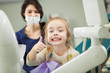 © Ilshat - Cheerful kid with broad smile after teeth polishing procedure