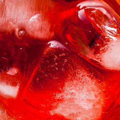 Wall Mural - closeup photo of raspberries drink with ice . red macro food bac