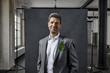 © Westend61 - Portrait of businessman with leaf in pocket