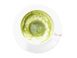 Empty matcha green tea latte cup with stains isolated on white background.