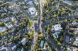 Aerial view of six way intersection at N Beverly Drive, N Canon Drive and Lomitas Ave in Beverly Hills, California.