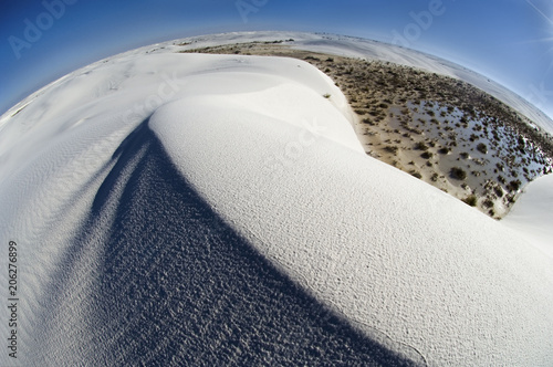 Fotografia, Obraz Swirling ridges and textured patterns of sand accentuate a more global perspective of White Sands National Monument
