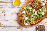 Fototapeta Kuchnia - Salad with raw vegetables