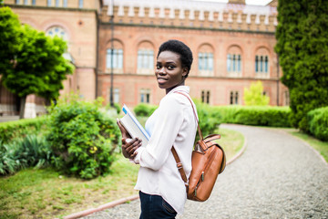 Young attractive african university student on campus