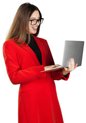 Canvas Print - Young woman in formal outfit using her laptop isolated on white background