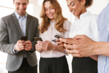 Wall Mural - Close up of a group of young multiethnic businesspeople