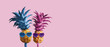 Couple pineapples on pink background minimal summer love concept
