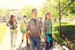 © Syda Productions - education, high school, learning and people concept - group of happy teenage students walking outdoors