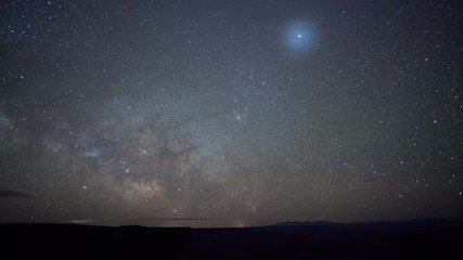 Wall Mural - Time Lapse of the stars, Milky Way and the moon moving across the nights sky.
