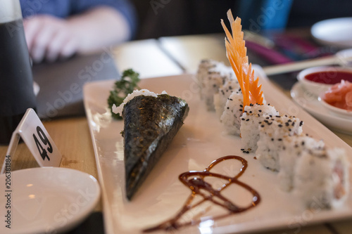Closeup Of Chinese Food With Sushi In Plate With Decorations Buy