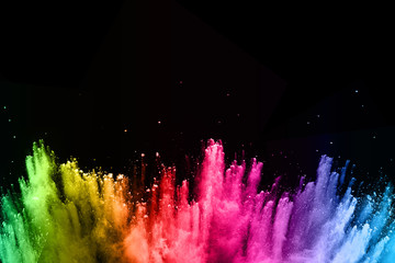 Wall Mural - multicolor powder explosion on black background.