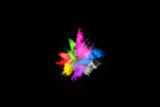 Fototapeta Motyle - Multicolor powder explosion on black background. 