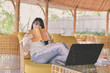 © S photographer - Business Concept.Young Asian businesswoman is working happily.Young businesswoman working in a cafe.Young businesswoman is relaxation in a coffee shop.