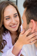 © LIGHTFIELD STUDIOS - close-up view of beautiful happy young woman looking at boyfriend at morning