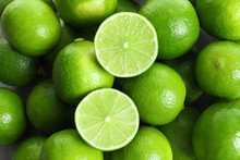 Fresh Ripe Green Limes As Background