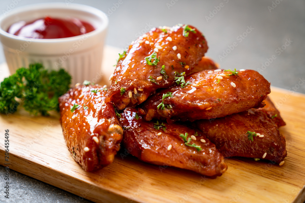 barbecue chicken wings with white sesame - obrazy, fototapety, plakaty 