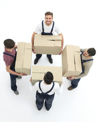 Delivery men with cardboard boxes on white background.