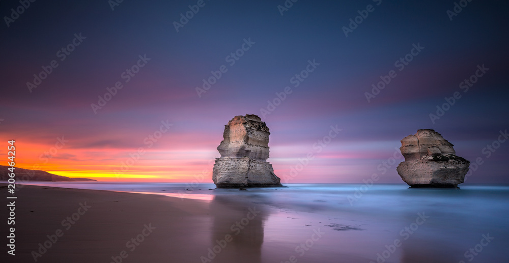 Two of the twelve apostles at sunrise from Gibsons beach, Great Ocean Road, Victoria, Australia - obrazy, fototapety, plakaty 