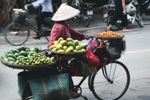 Street Vendor With Bicycle In Hanoi