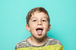 Child sticking out his tongue