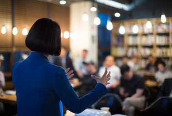 Fototapete - Woman Presenting to Audience. Business Presentation Conference Meeting