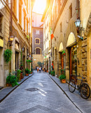 Fototapeta Uliczki - Narrow street in Florence, Tuscany. Italy
