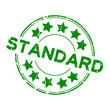 Grunge green standard wording with star icon round rubber seal stamp on white background