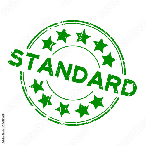 Fotografía Grunge green standard wording with star icon round rubber seal stamp on white ba