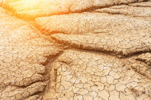 Brown Dry Soil Or Cracked Ground Texture Background.