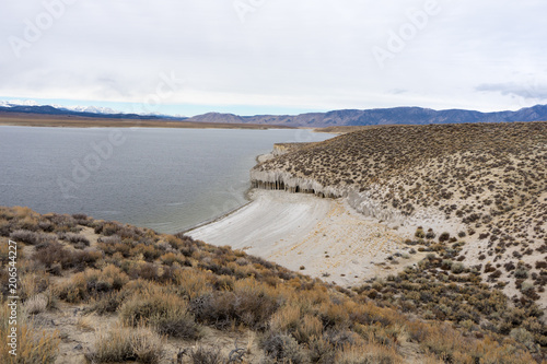 Stampe Crowley Columns as seen from above with a beautiful beach on the Crowley Lake sh