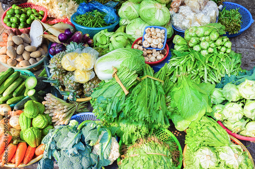 Poster Green vegetables on street market in Hanoi Vietnam