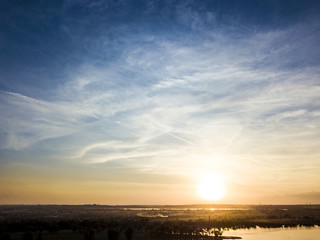 Wall Mural - absolutely amazing sunset dusk over the river with blue cloudy sky